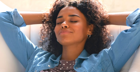 A woman relaxing on the couch