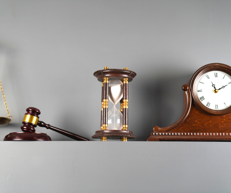 Gavel, hourglass and clock