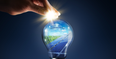 Light bulb with solar panels inside