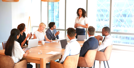 A woman addressing a meeting