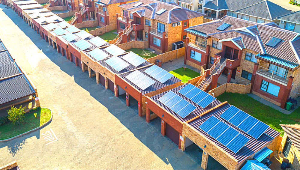 A sectional title scheme with solar panels on rooftops