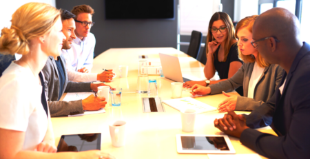 People meeting around a boardroom table