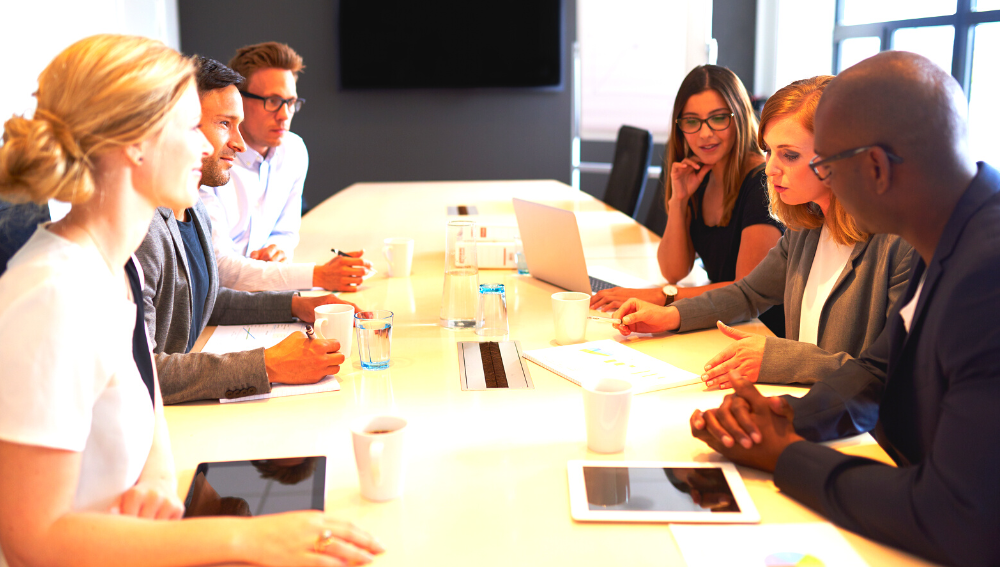 People meeting around a boardroom table